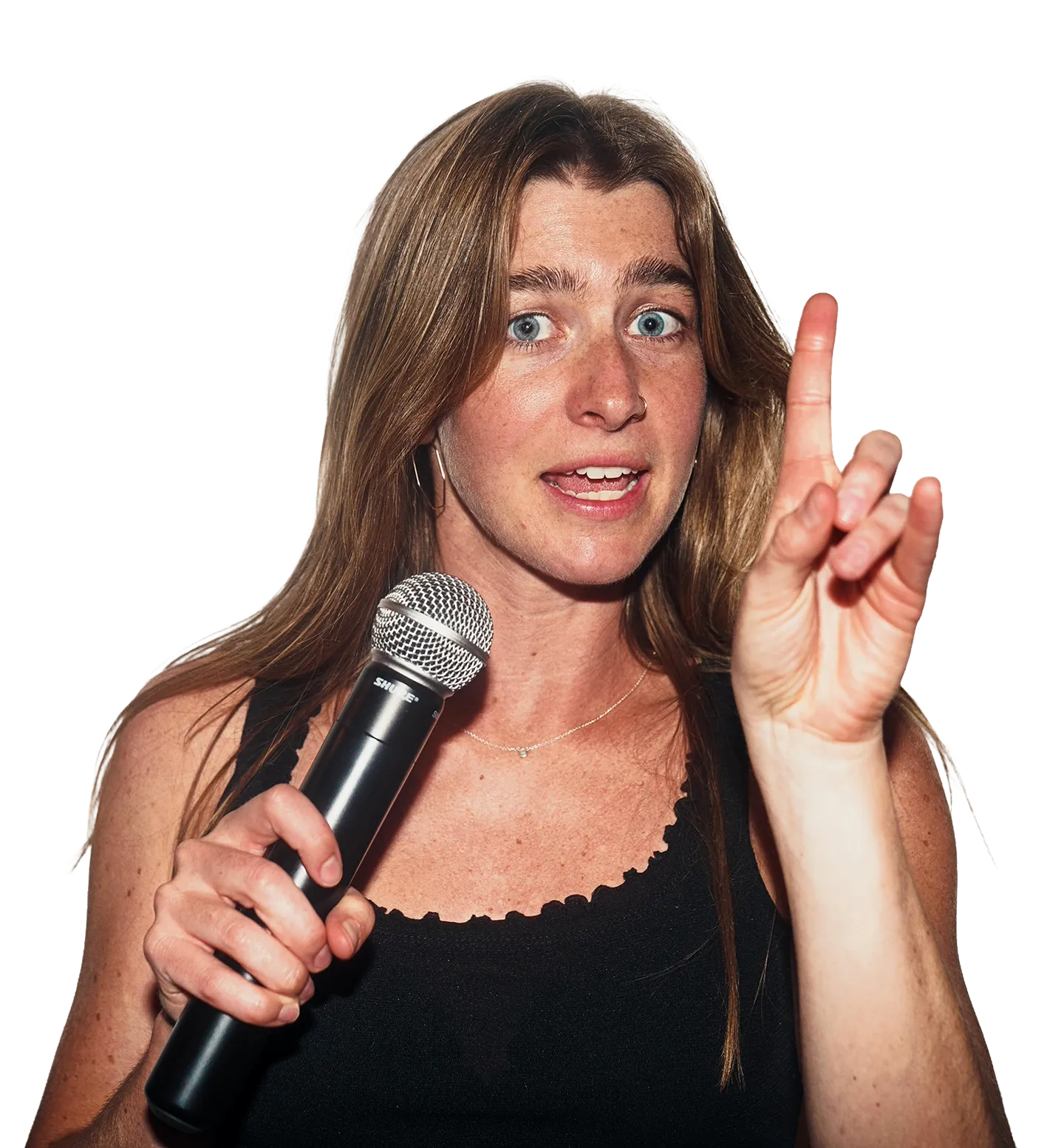 A comedian with a microphone at Hambone Comedy