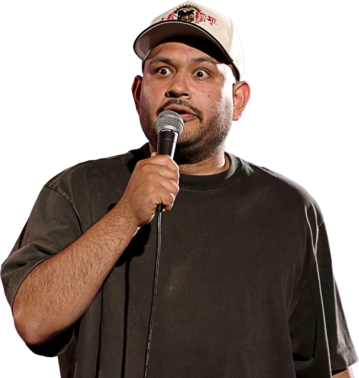 A comedian holding the mic at Hambone Comedy
