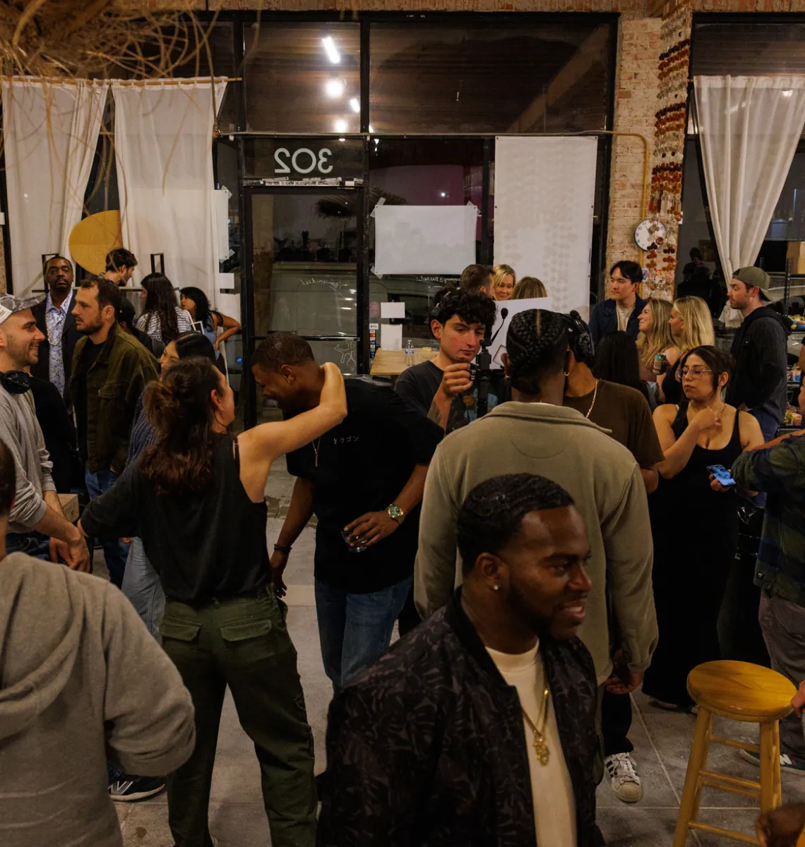 The crowd mingling before a Hambone Comedy show